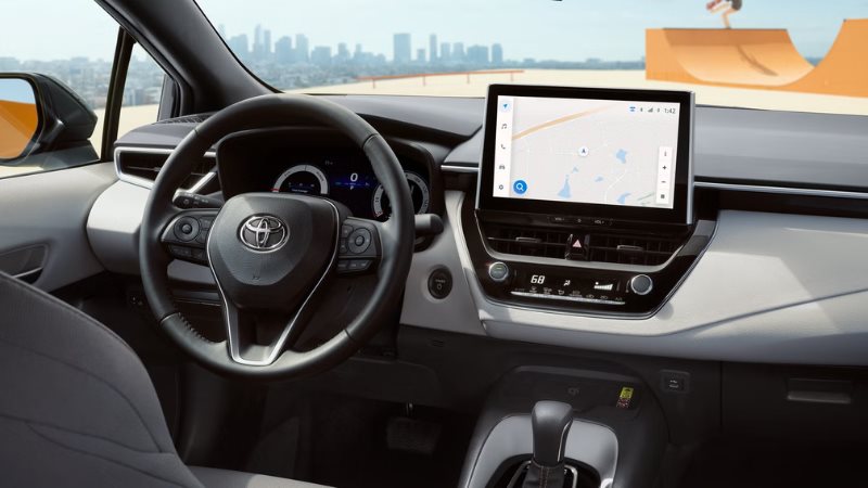 2027 Toyota Corolla interior showing the touchscreen and digital gauge cluster