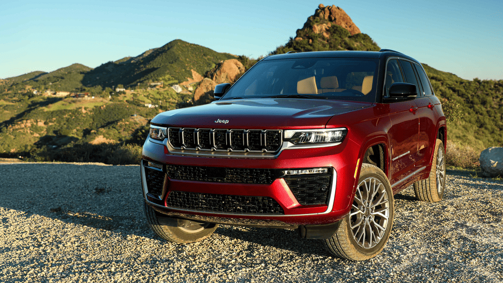 Refreshed 2026 Jeep Grand Cherokee in red with new LED tech and premium wheels in Margate FL