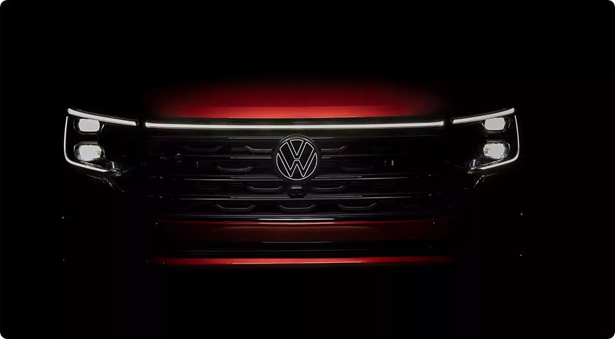LED headlights and front light bar of the Volkswagen Atlas at night