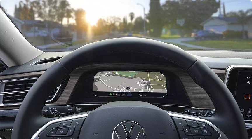 Digital Cockpit Pro showing a navigation map behind the steering wheel