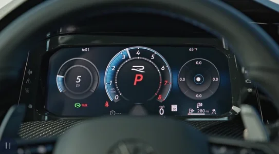 Volkswagen Digital Cockpit Pro showing performance gauges behind the Golf R steering wheel