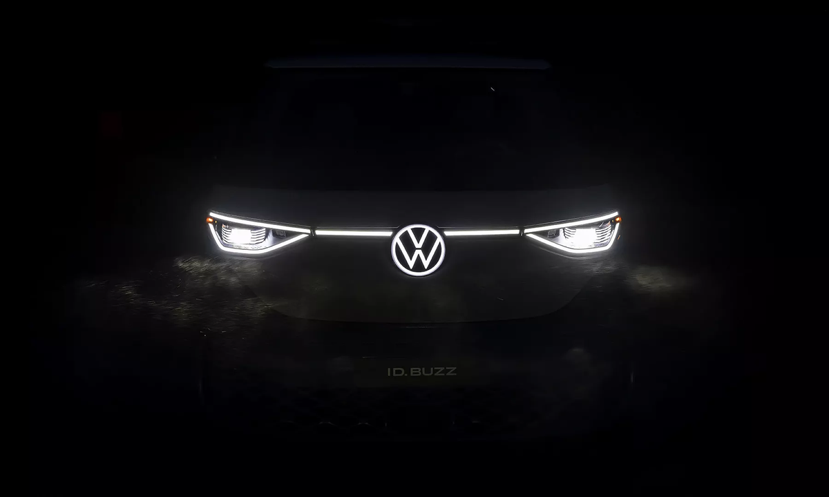ID. Buzz front light line and illuminated VW logo glowing in the dark