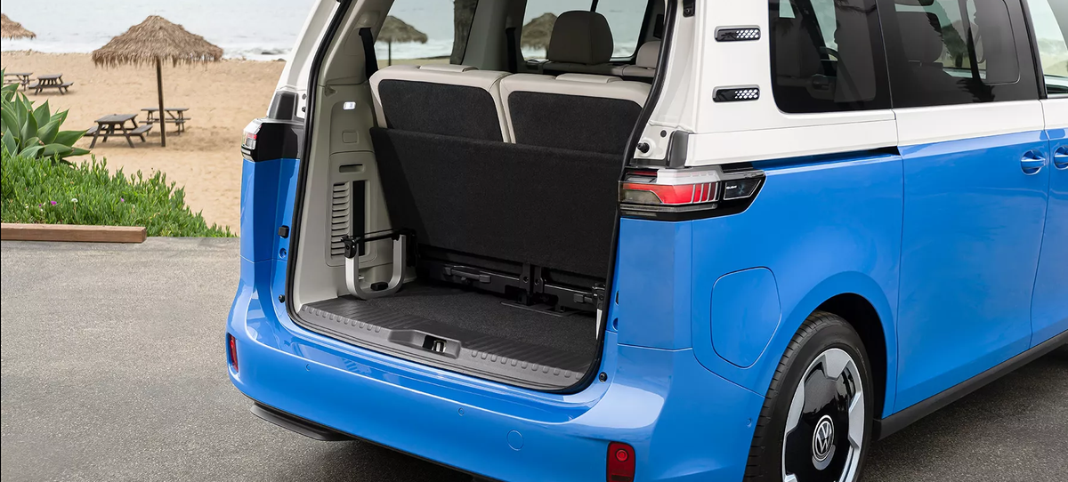 ID. Buzz with its rear liftgate open, showing the cargo area