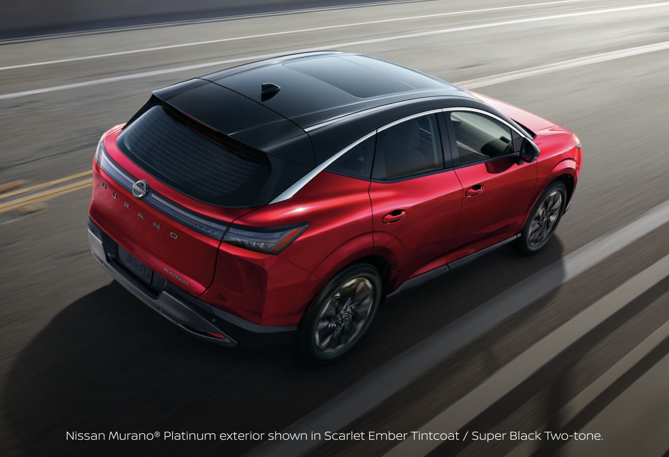High-angle rear three-quarter view of a 2027 Nissan Murano Platinum in Scarlet Ember Tintcoat and Super Black driving on a highway.