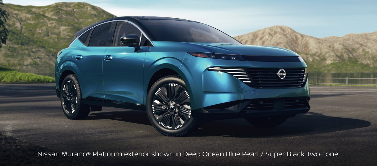 Front three-quarter view of a 2027 Nissan Murano Platinum in Deep Ocean Blue Pearl and Super Black on a mountain road.