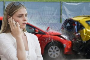 Driver on the phone after a car accident