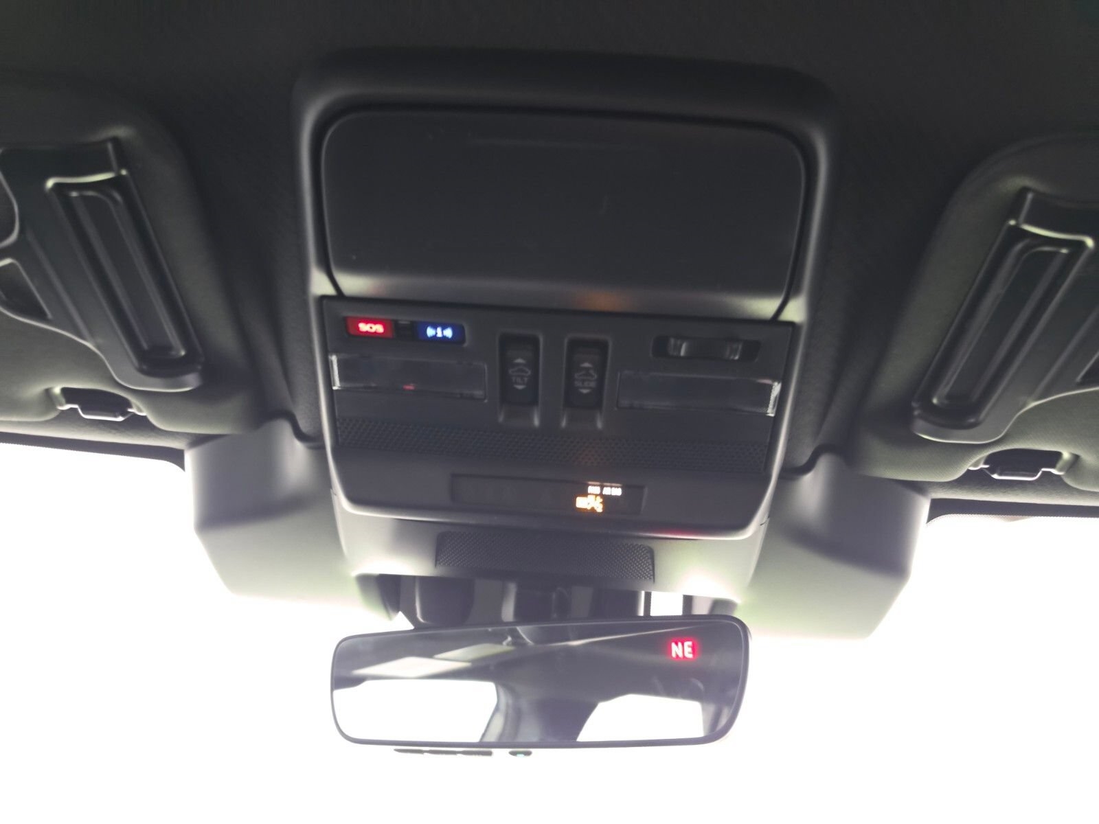 The overhead console and rear-view mirror of a Subaru Outback