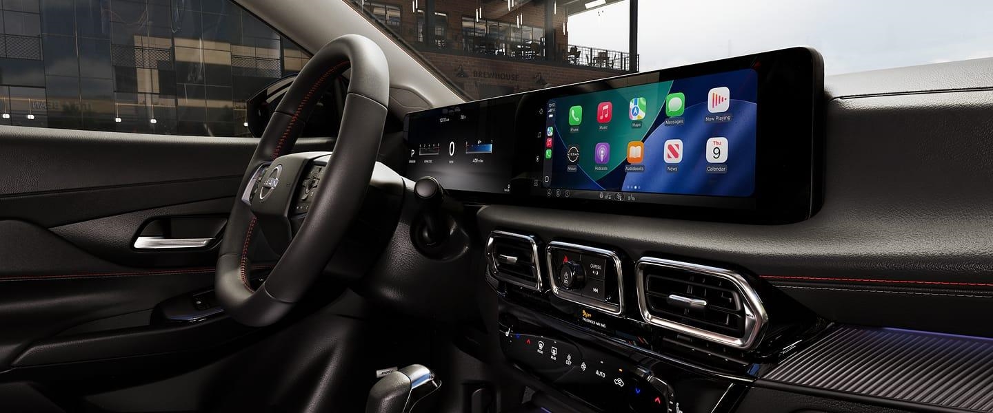 2027 Nissan Sentra interior view of the monolith displays of 2 12.3 inch digital screens.