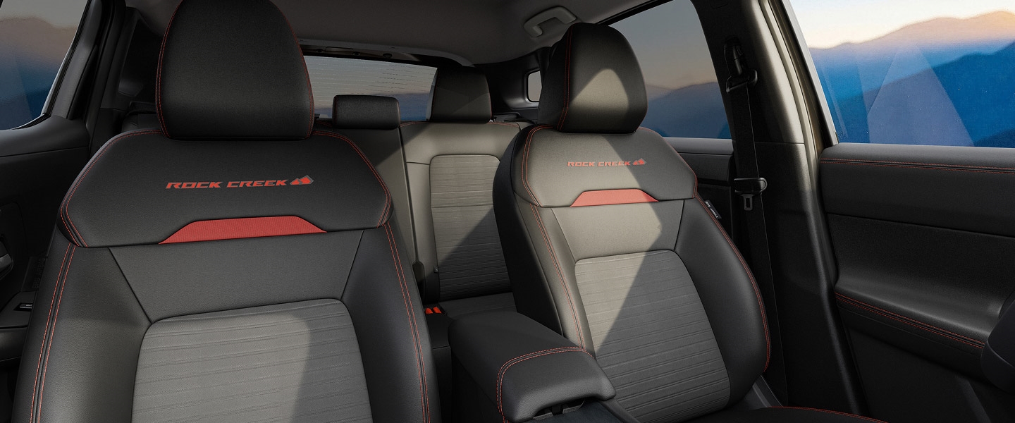 2027 Nissan Kicks Rock Creek five-seat cabin viewed from the front toward the rear seats.