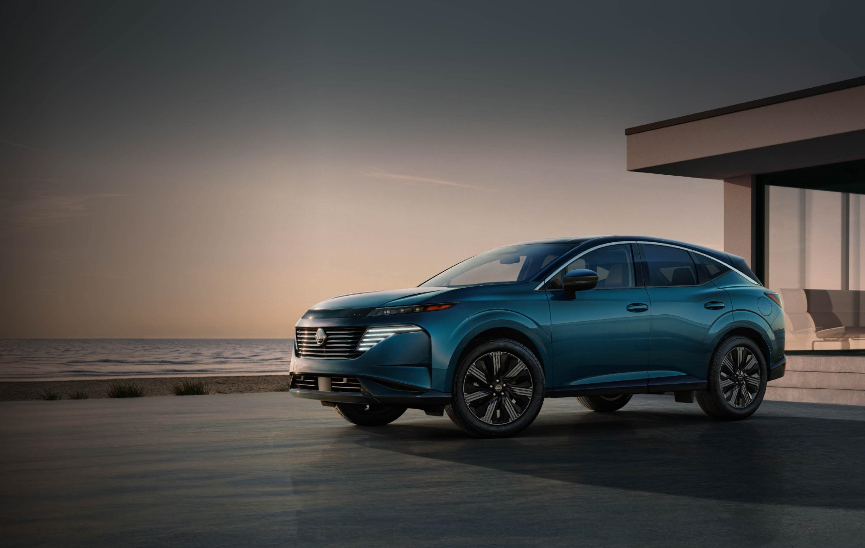 2026 Nissan Murano parked in the driveway of a coastal home.