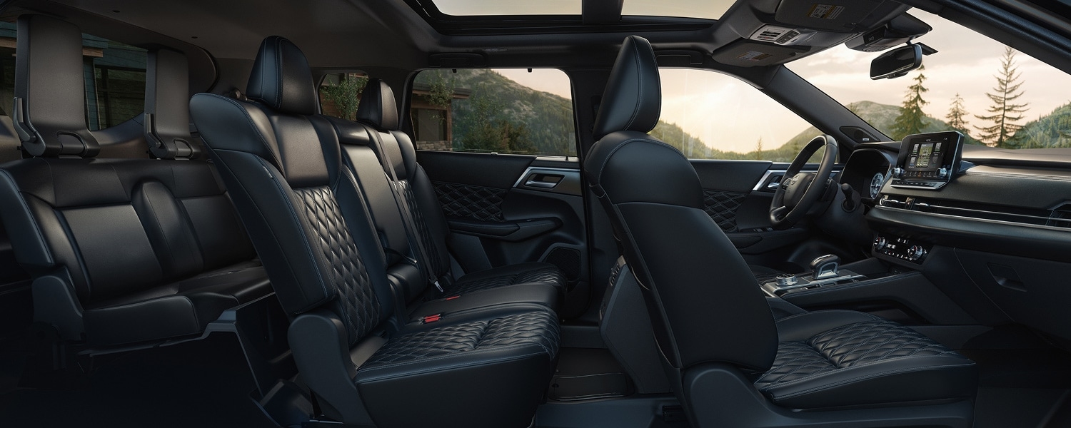 Three-row passenger cabin inside the 2026 Nissan Rogue Plug-in Hybrid.