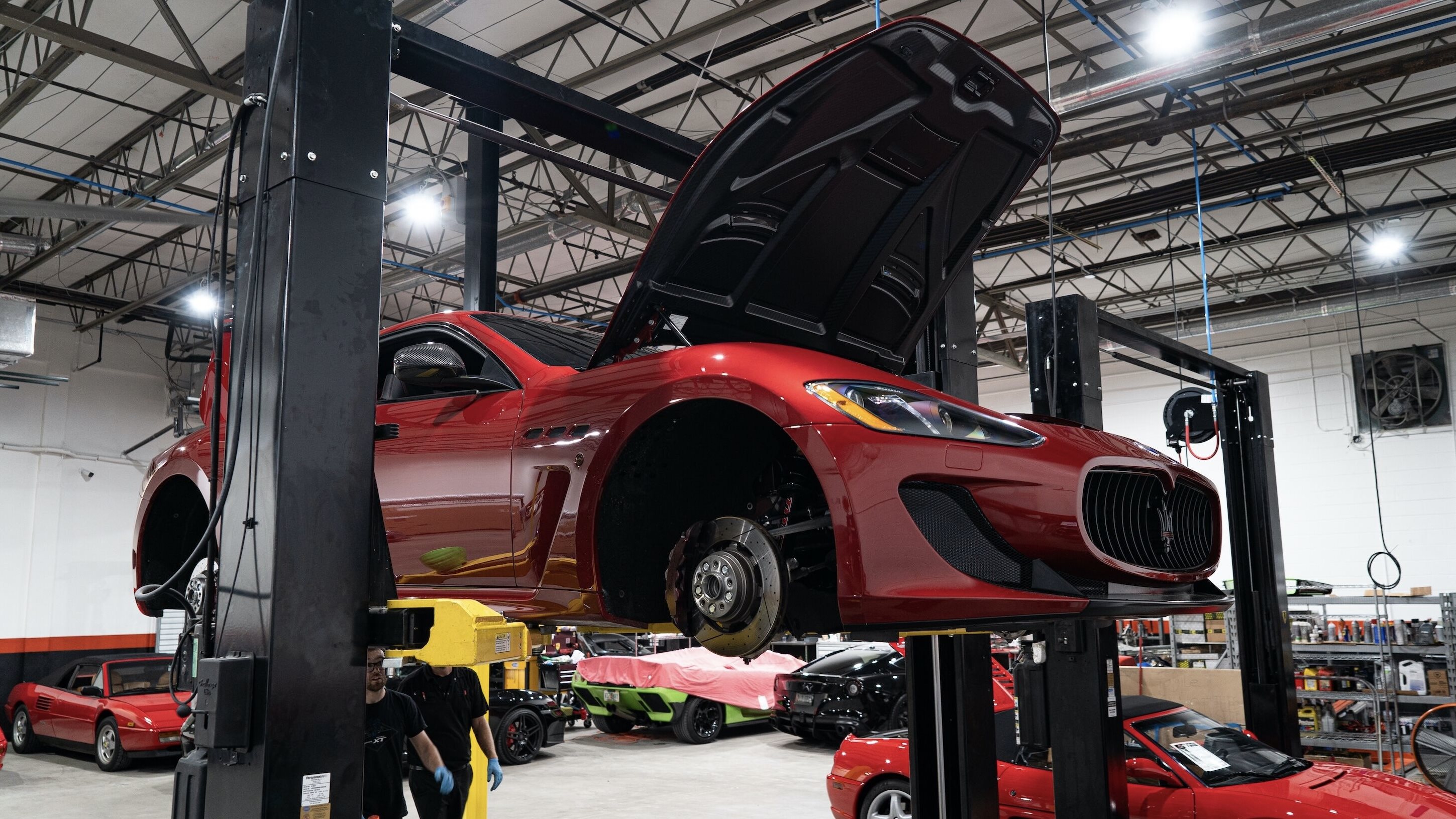 A Maserati in for scheduled maintenance, illustrating service intervals for the Grecale and Levante.