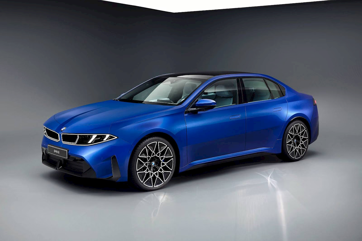 Blue new BMW 3 Series sedan, front three-quarter view, for Fairfield County drivers comparing the BMW 330 and BMW 330 xDrive