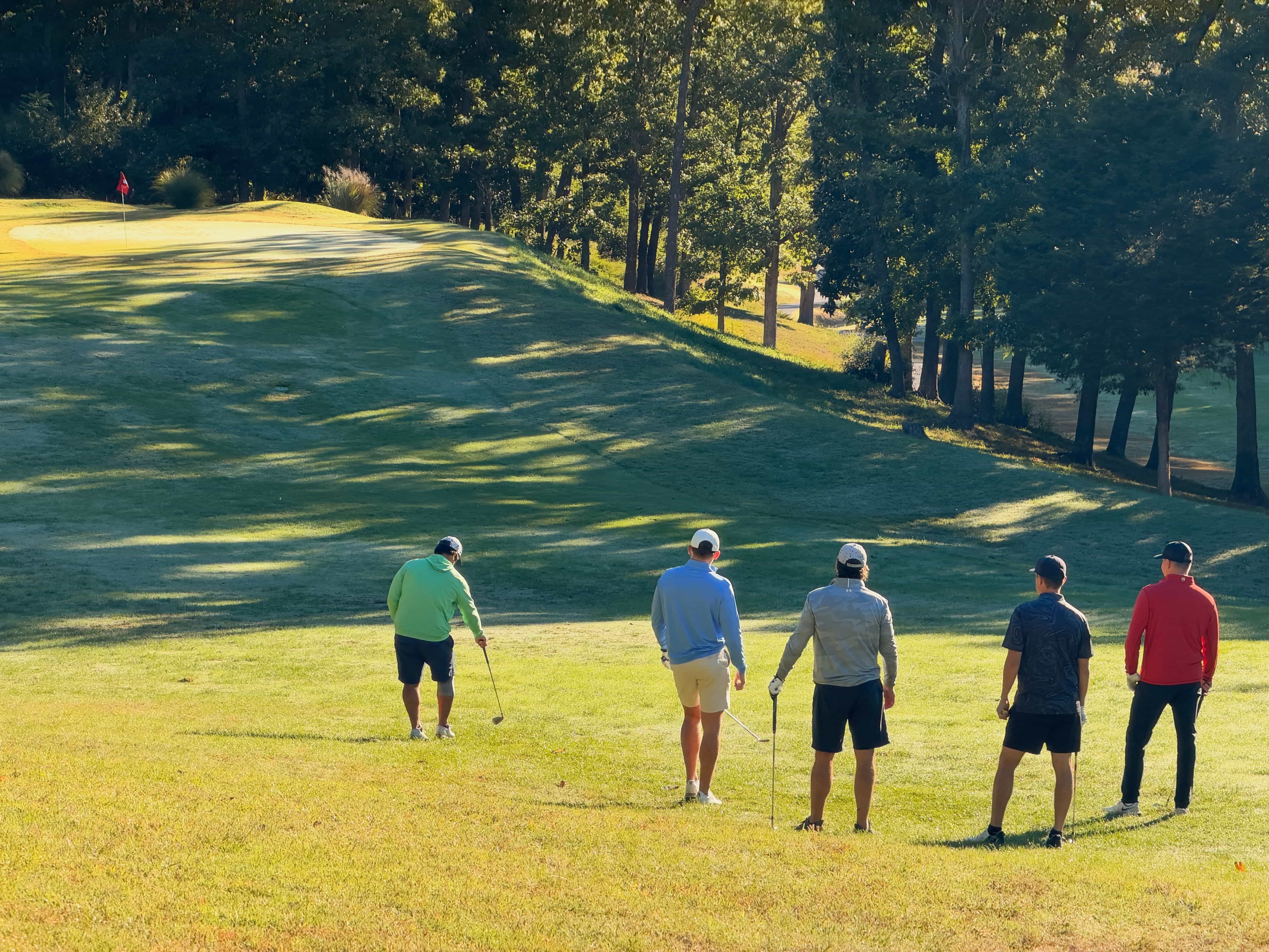 Golfers walking the course at Sugar Creek Golf Course