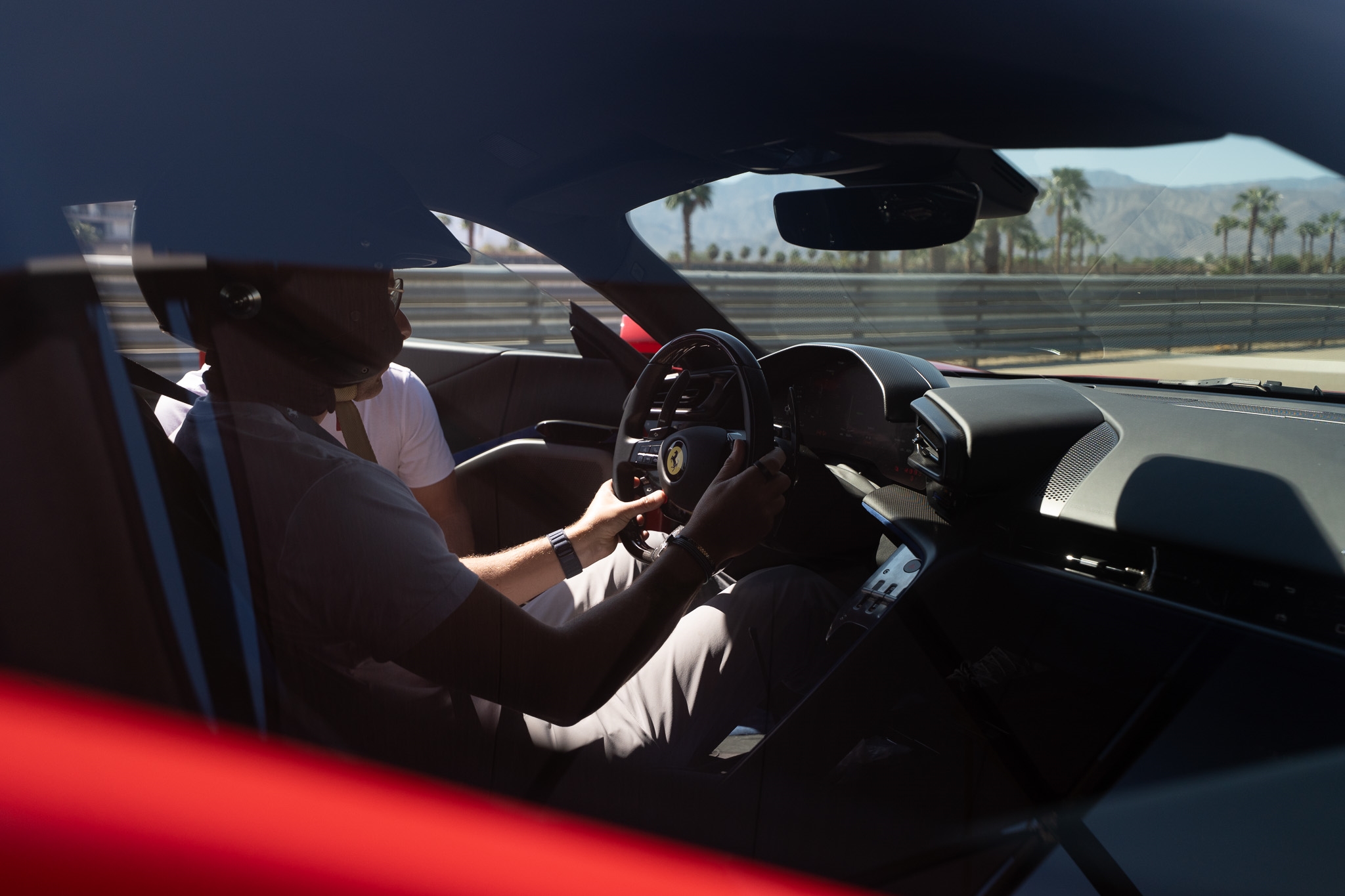 man driving ferrari