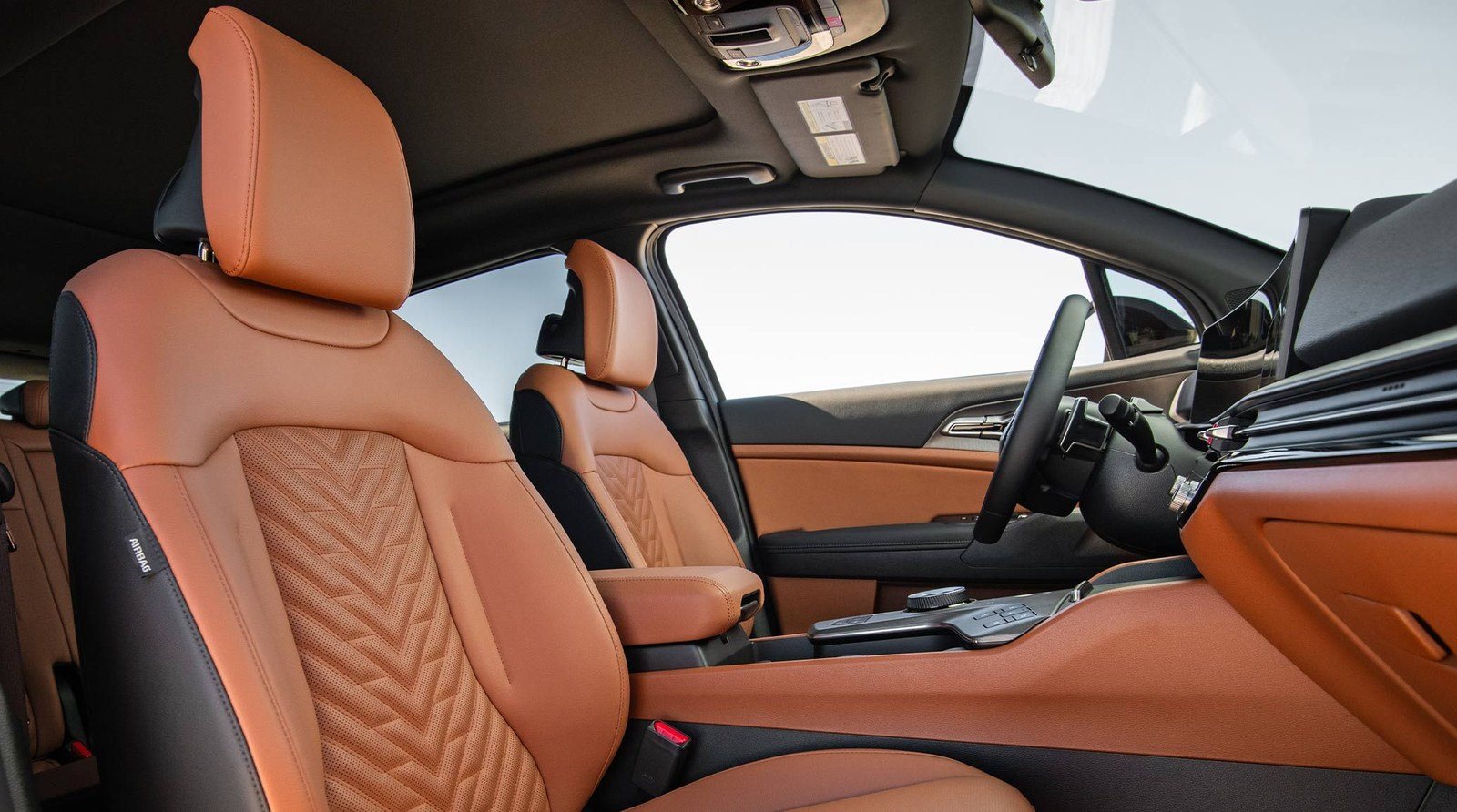 Leather front seats in a 2027 Kia Sportage SX Prestige with ventilated seating