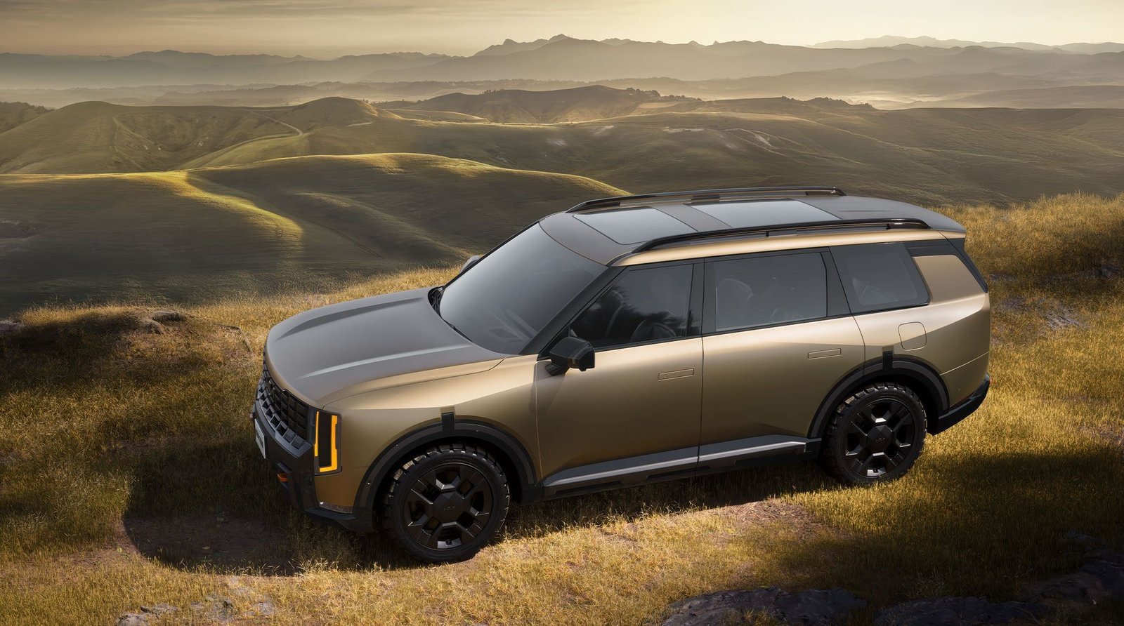 2027 Kia Telluride X-Pro on a grassy Colorado hillside
