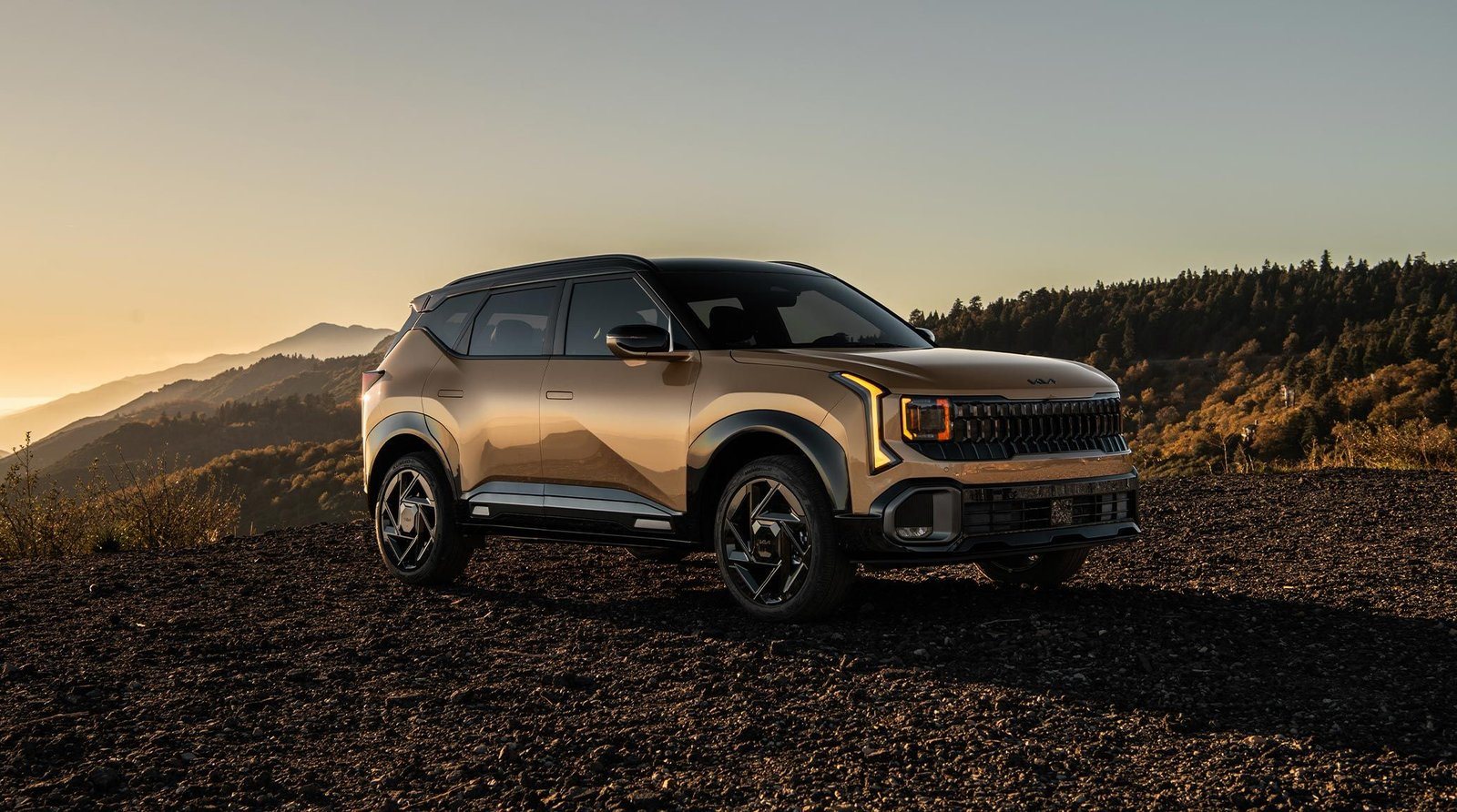 Redesigned 2027 Kia Seltos X-Line at sunset on a mountain overlook