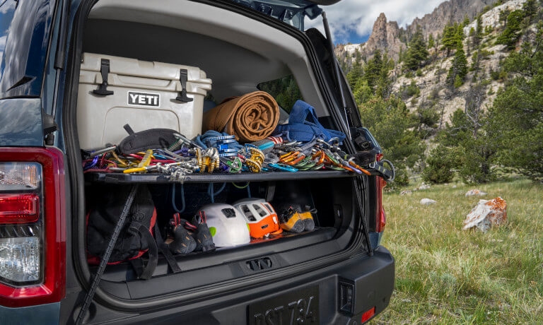 26Ford-Bronco-InteriorBackHatchOpenWithCargo