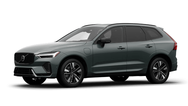 Green Volvo XC60 Plug-in Hybrid SUV shown from a front three-quarter angle.