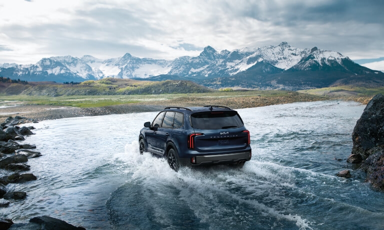 2024 Kia Telluride driving in a stream