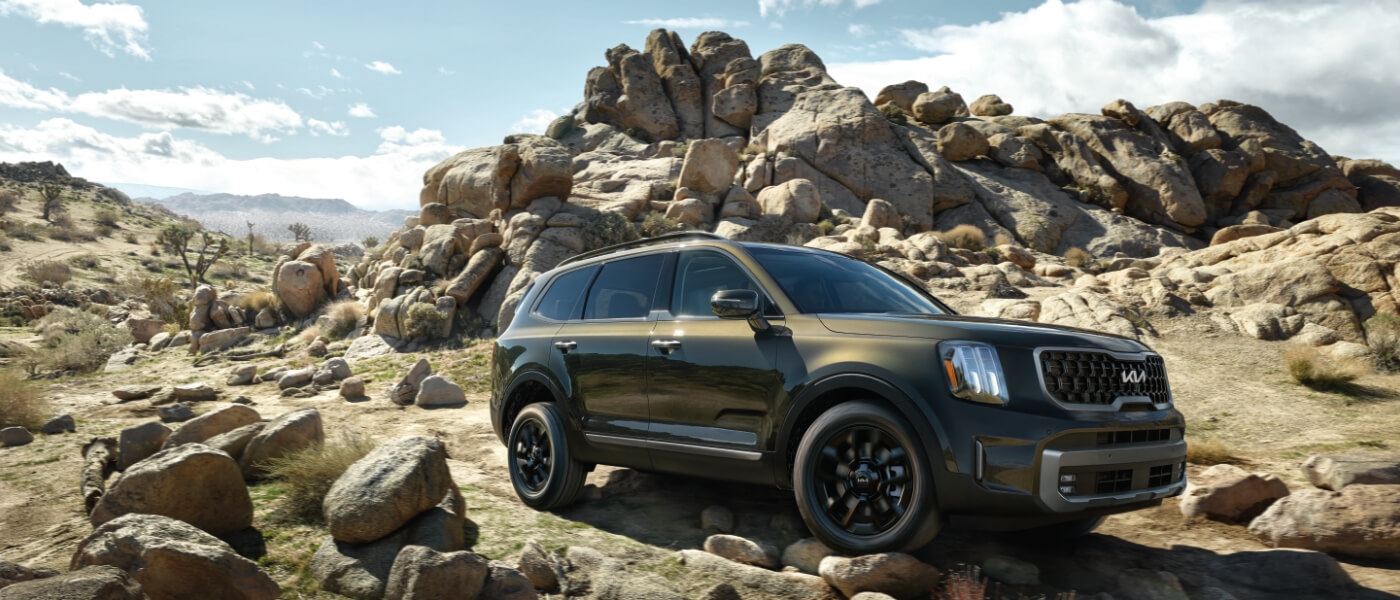 2024 Kia Telluride driving over rocks